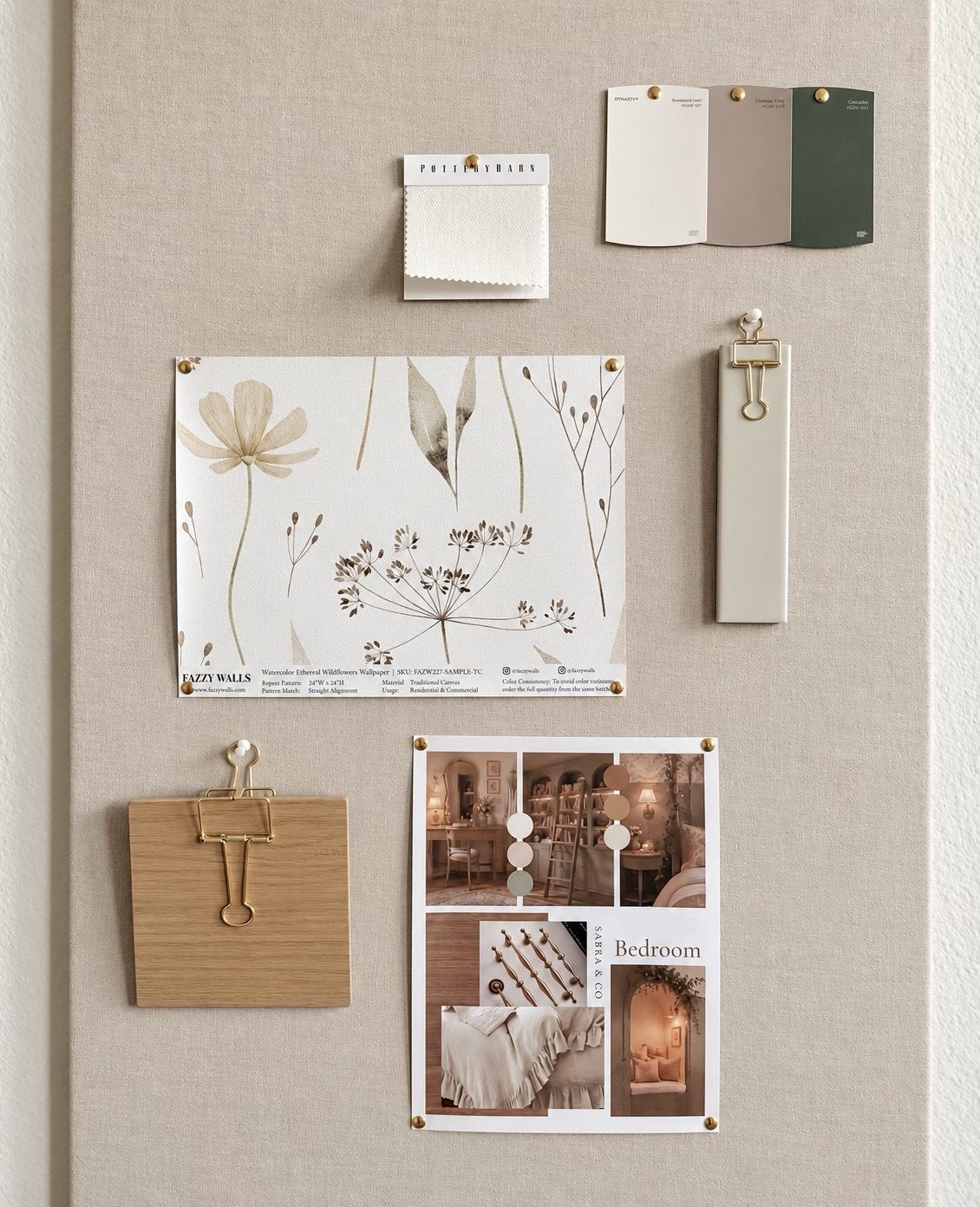 Design sample board on linen with paint chips, a fabric swatch, a wallpaper sample, a wood finish sample, hardware and a printed Sabra & Co. bedroom mood board